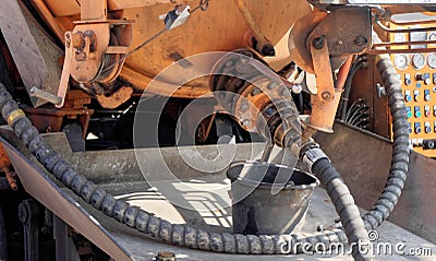 Connection for the hose of a water wagon with a vacuum extraction system for removing water and sludge from the excavation pit Stock Photo