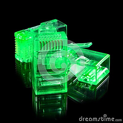Connector rj-45. Three neon green transparent connectors rj45 for network and internet. Close-up macro isolated on black Stock Photo
