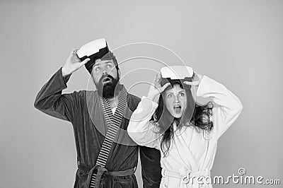 Conscious awakening. Return to reality. Man and woman explore vr. VR technology and future. VR communication. Exciting Stock Photo