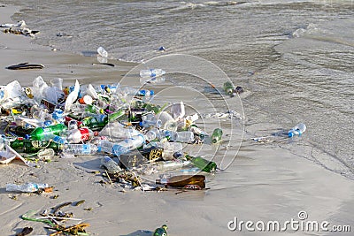 Consequences of sea water pollution on the Haad Rin beach after the full moon party on island Koh Phangan, Thailand Editorial Stock Photo