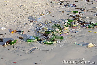 Consequences of sea water pollution on the Haad Rin beach after the full moon party in island Koh Phangan, Thailand Editorial Stock Photo