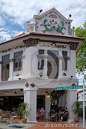 Conserved Peranakan shophouse along Joo Chiat Road, Singapore, with distinctive Chinese dragons & rococo architectural designs Editorial Stock Photo