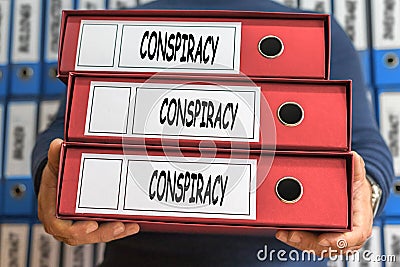 Conspiracy concept words. Folder concept. Ring binders. Stock Photo