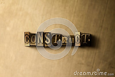 CONSTRUCT - close-up of grungy vintage typeset word on metal backdrop Cartoon Illustration