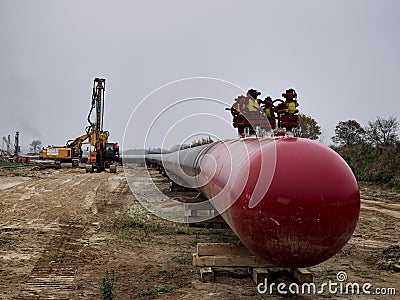 Constructing a gas pipeline between Russia and Western Europe. Editorial Stock Photo