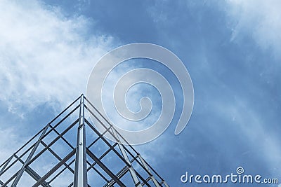 The construction of buildings with steel structure on sky background Stock Photo