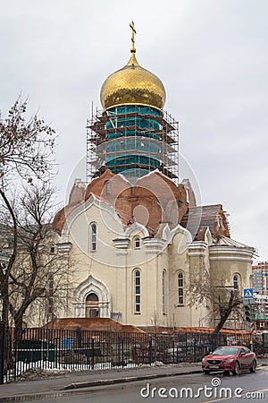 Construction of the Cathedral of St. Andrei Rublev in Moscow municipal district Ramenki. Editorial Stock Photo