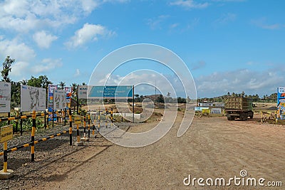 Construction of a complex on the Motogp Mandalika circuit, West Nusa Tenggara, Lombok, Indonesia. Banners with a plan of the area Editorial Stock Photo