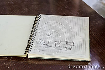 construction drawing in the notebook with pen Stock Photo