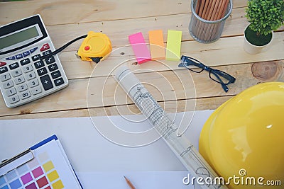 construction engineer office desk architect workplace. engineer drawing objects table with meter, blueprint, hard hat engineering Stock Photo