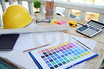 construction engineer office desk architect workplace. engineer drawing objects table with meter, blueprint, hard hat engineering Stock Photo