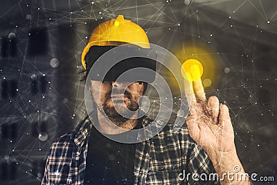 Construction engineer with VR goggles managing building project Stock Photo