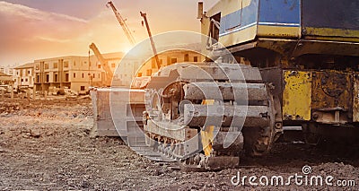 Construction equipment in construction new building background, excavator with crane on construction site Stock Photo