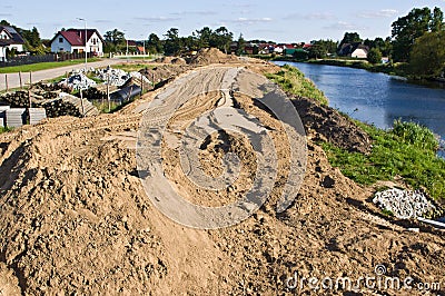 Construction of a floodbank or levee along a river Stock Photo