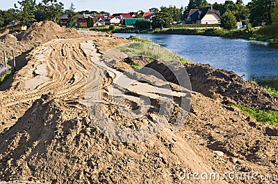 Construction of a floodbank or levee along a river Stock Photo