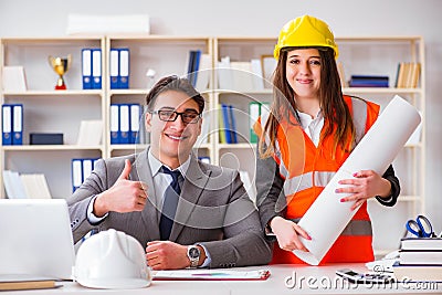 The construction foreman supervisor reviewing drawings Stock Photo