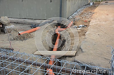 construction of a gabion retaining wall, as part of the house fencing. Stock Photo