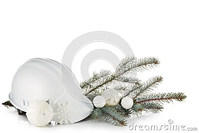 Construction hard hat, fir tree branches and Christmas ornament isolated on a white background. New Year and Christmas. Horizontal Stock Photo