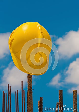 Construction helmet on steel bars Stock Photo