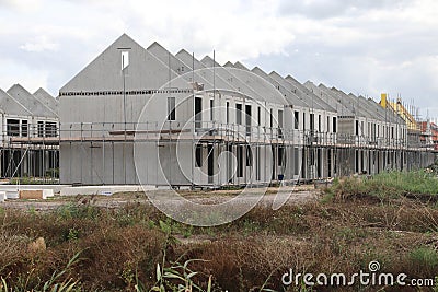 Construction of houses in a new residential district Koningskwartier in Zevenhuizen the Netherlands. Editorial Stock Photo