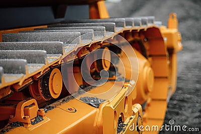 Construction machinery. Caterpillar part of construction equipment close-up. Stock Photo