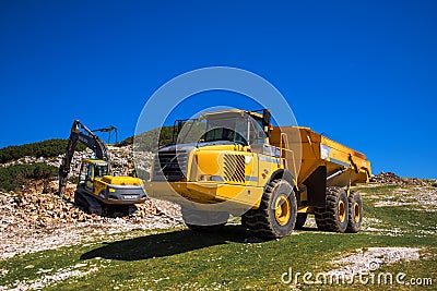 Construction machinery for crushing stone Editorial Stock Photo