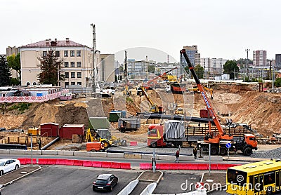 Construction machinery and equipment on construction site. Temporary traffic regulation from carrying out road works. Minsk, Editorial Stock Photo