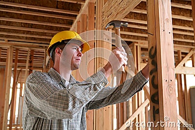 Construction Man Using Hammer Stock Photo