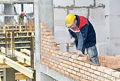 Construction mason worker bricklayer Stock Photo