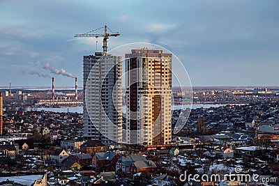 Construction of modern skyscrapers in low-rise area of the city of Voronezh Stock Photo