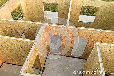 Construction of new and modern modular house. Walls made from composite wooden sip panels with styrofoam insulation inside. Stock Photo