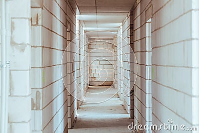 Construction, not completed corridor and exits to further rooms Stock Photo