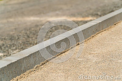 Construction of pedestrian roads. Sidewalk pavement. Laying paving slabs. Street construction Stock Photo