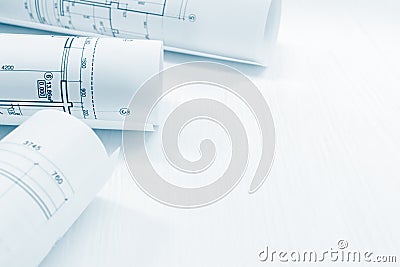 Construction plan, engineering drawings and blueprint rolls on d Stock Photo