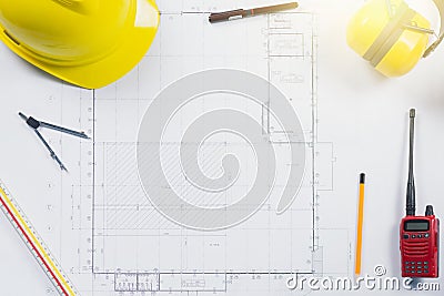 Construction plans with yellow helmet and drawing Stock Photo