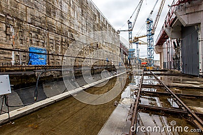 Construction of a river dam across the Kolyma River in Russia Editorial Stock Photo