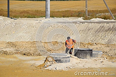 Construction of sewer hatches. Sewer Editorial Stock Photo