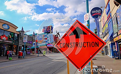 Construction sign seen in the Canadian tourist destination of Niagara Falls, Ontario, Canada. Editorial Stock Photo