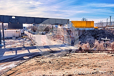 Construction site of a bridge, scaffolding and cladding, blue sky Stock Photo