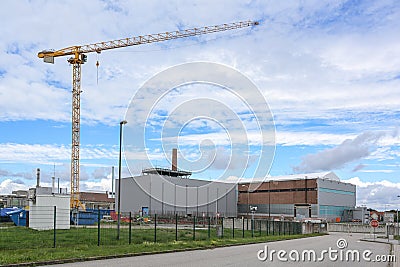 Construction site with crane at the interim storage facility of the former nuclear power plant in Lubmin near Greifswald in Stock Photo
