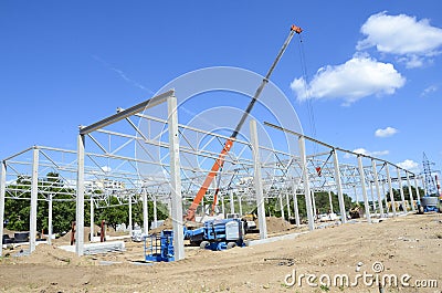 Construction site with cranes building a warehouse Stock Photo