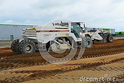 Construction site with ground movement machinery at work Editorial Stock Photo