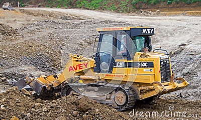 Construction Site with heavy excavating machinery Editorial Stock Photo