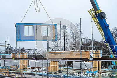 Construction site of the modern house from the wooden blocks Stock Photo