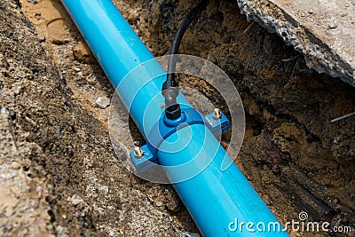 Construction site with new Water Pipes in the ground. sewer pipes to repair or restore in street city Stock Photo