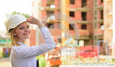 Construction site safety inspection. Construction project inspecting. Safety inspector concept. Woman inspector front Stock Photo