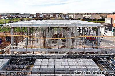 Construction site with steel formworks and reinforcing bars for pillars ready for concrete Stock Photo