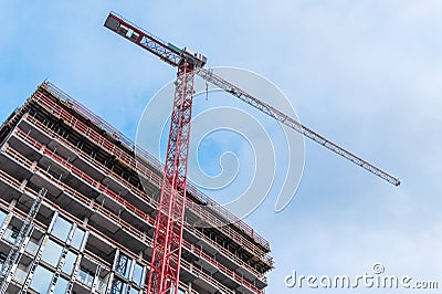 Construction Site with Tall Tower Crane Stock Photo