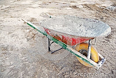 Construction site wheelbarrow Stock Photo