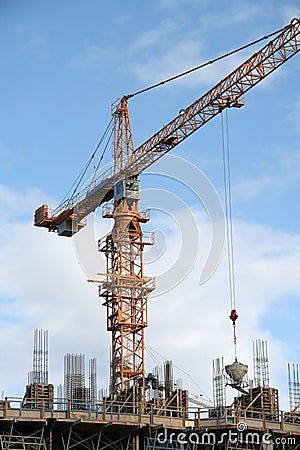 A construction site with a yellow crane Stock Photo